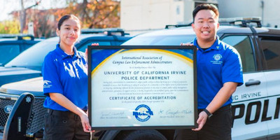 Community safety ambassadors proudly display the IACLEA certificate of accreditation for the UCI